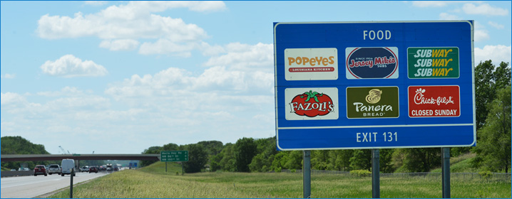 Logo sign near interstate