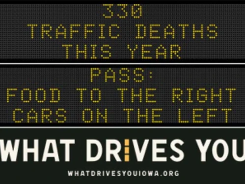 Traffic roadside graphic with text of the news article title.