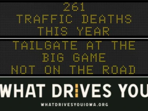 Traffic roadside graphic with text of the news article title.