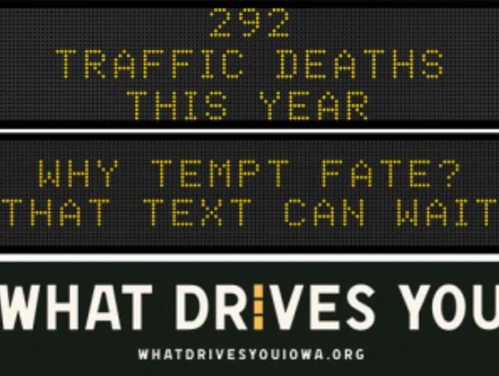 Traffic roadside graphic with text of the news article title.