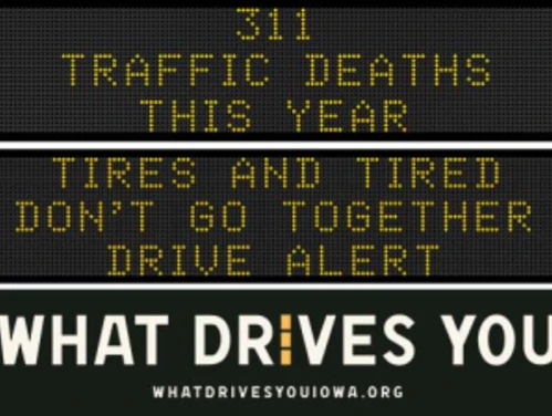 Traffic roadside graphic with text of the news article title.
